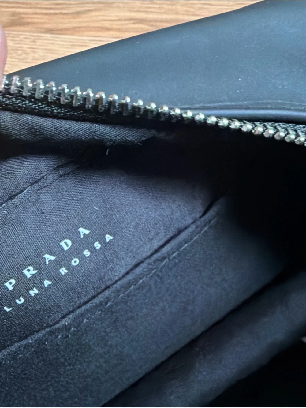 Prada Black Toiletry Pouch with Red Logo Stripe